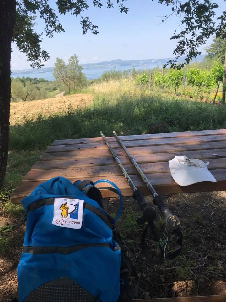 Backpack on a bench in the countryside