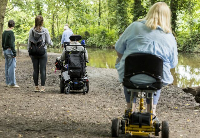 Wheelchair user on easy access walk