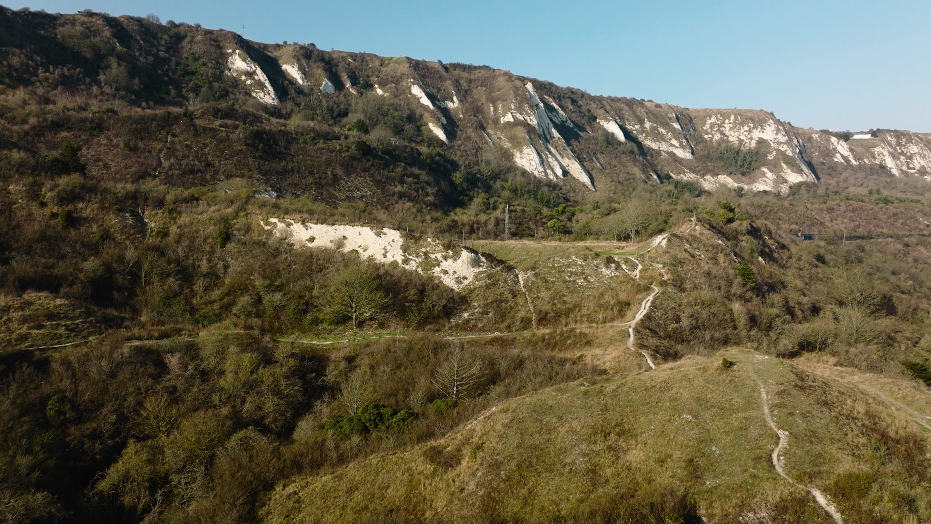 Rolling hills, and chalk cliffs landscape, on a sunny day.