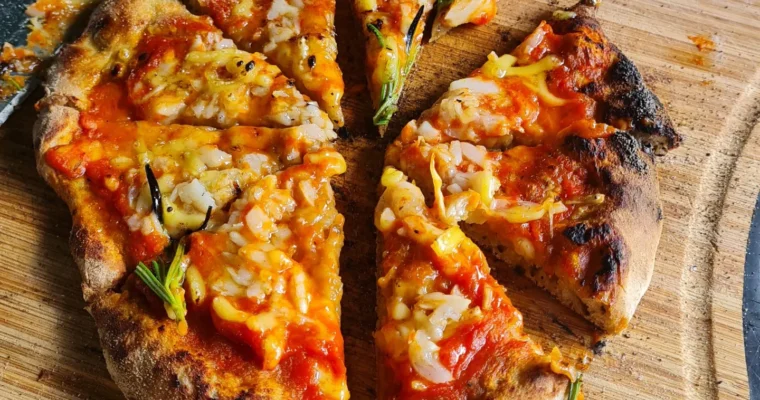 Pizza close-up cut into slices.