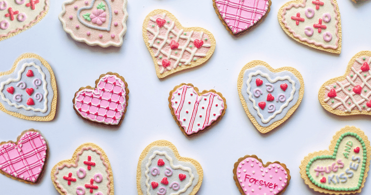 Heart shaped cookies with decorative icing.