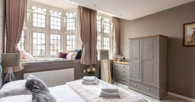 Double bedroom, with bay window and wardrobe in Idyllic Retreats.