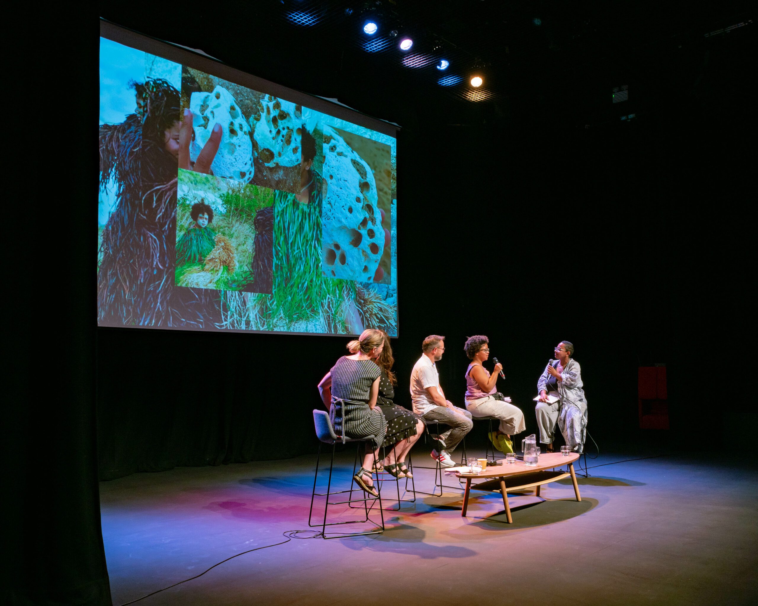 Stage with speaks in front of screen