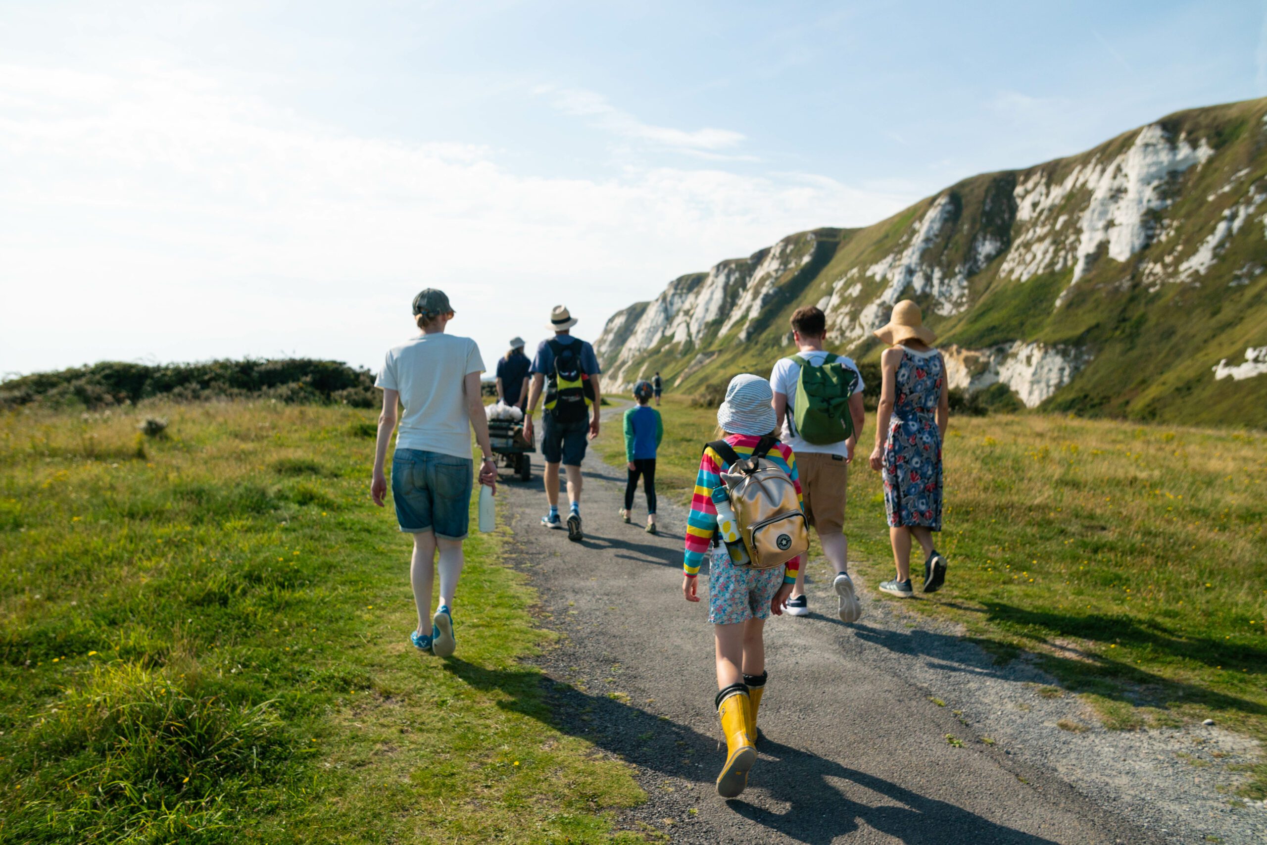 Group of people walking on path at Samphire Hoe