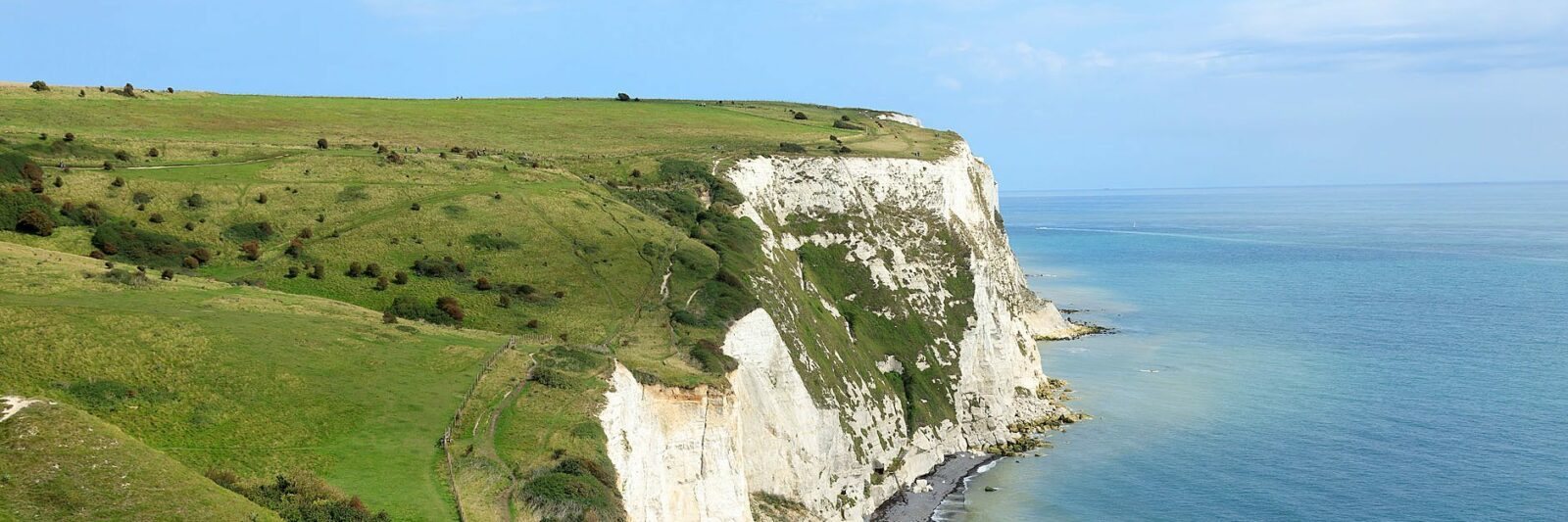 View over the top of the White Cliffs of Dover against the blue Channel