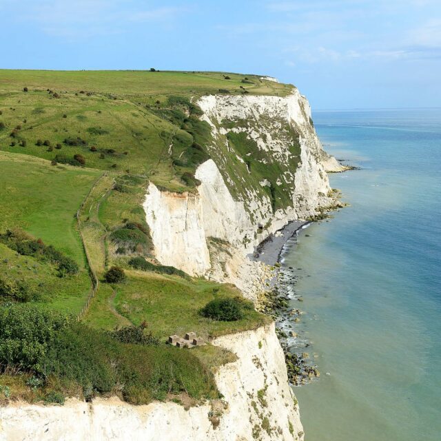 View over the top of the White Cliffs of Dover against the blue Channel