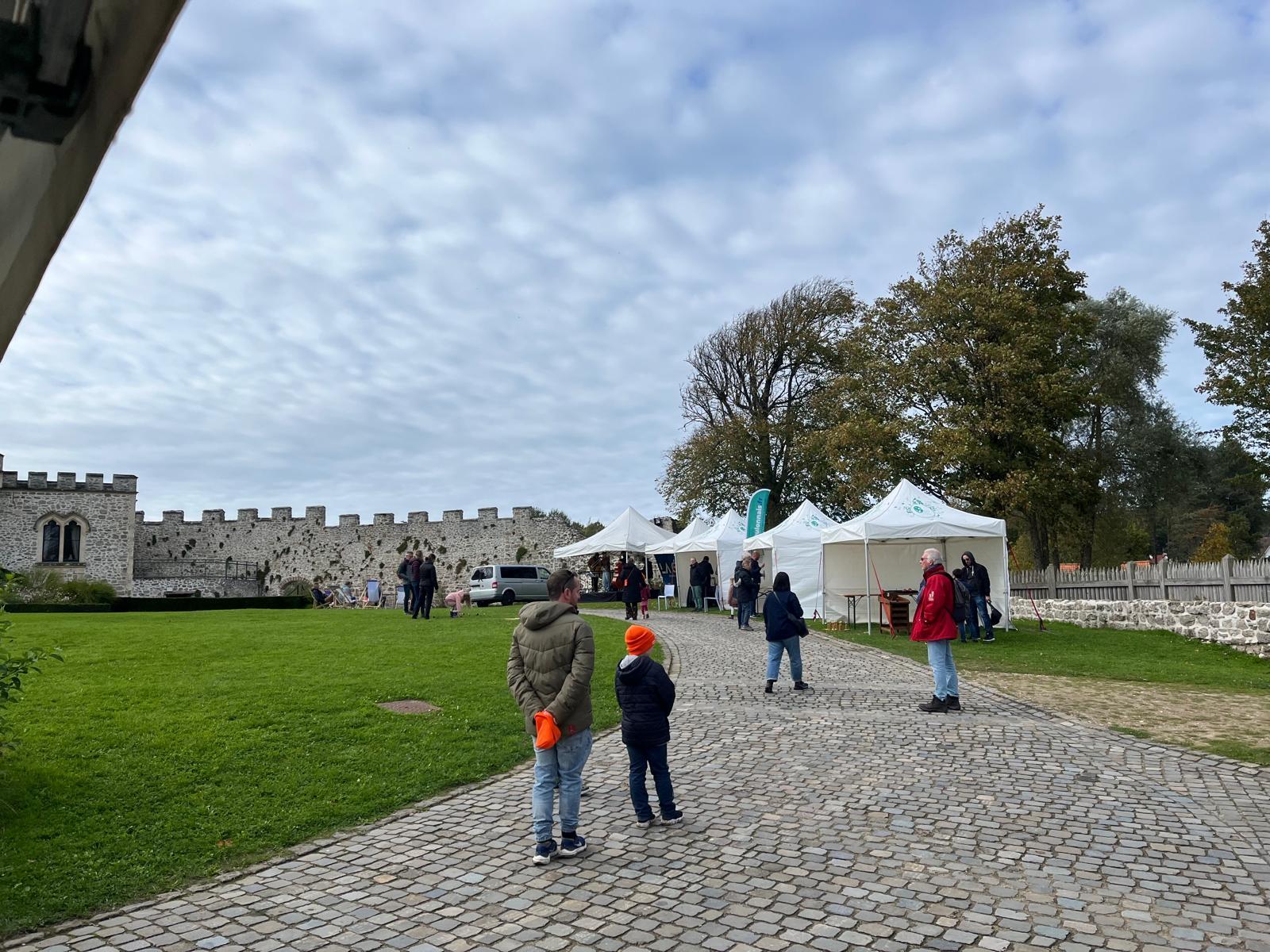 Geopark Festival stalls outlining the gardens at the chateau