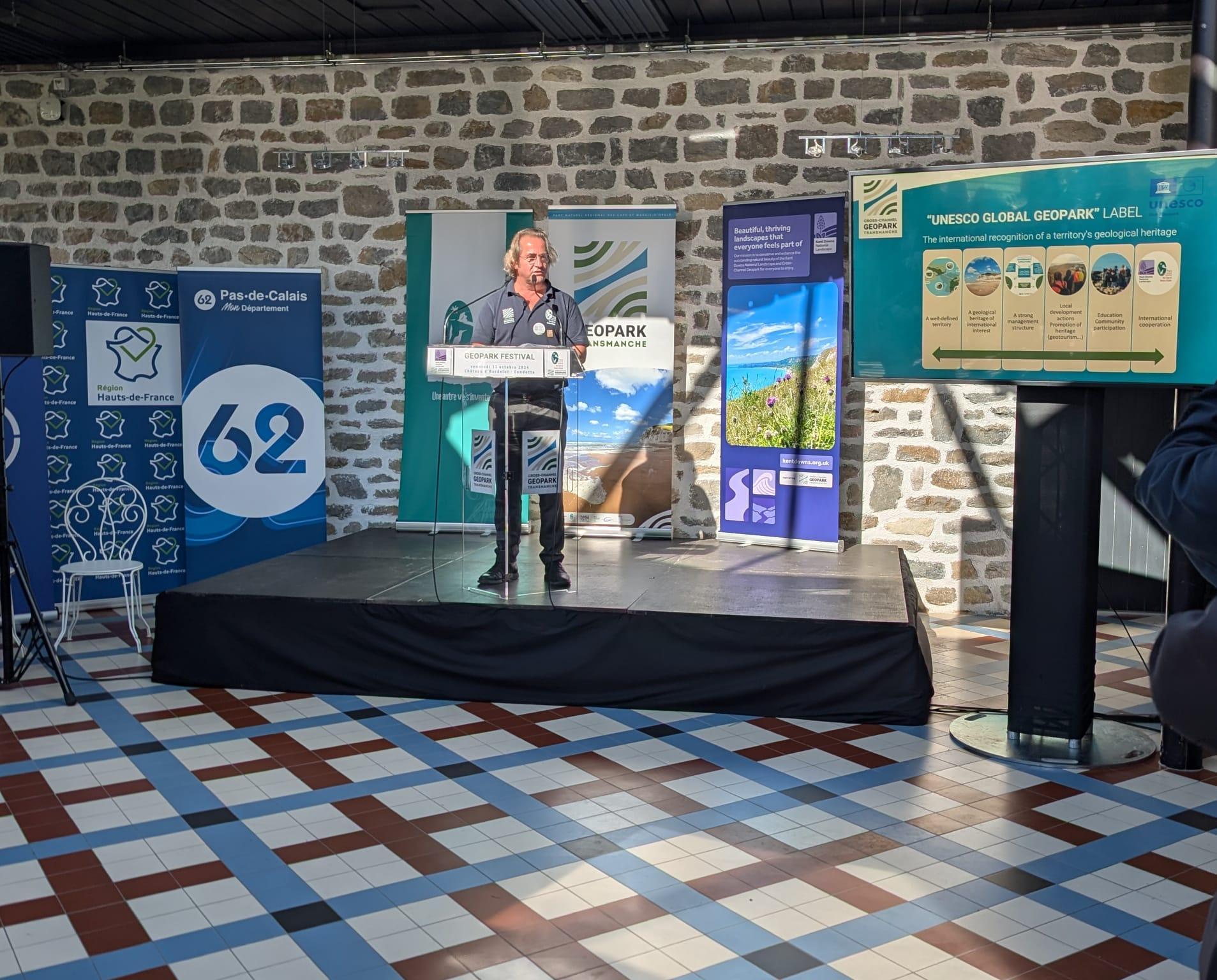 The official reception for the launch of the geopark gathers important partners and stakeholders. The event takes place in a formal setting, with speeches highlighting the significance of the geopark