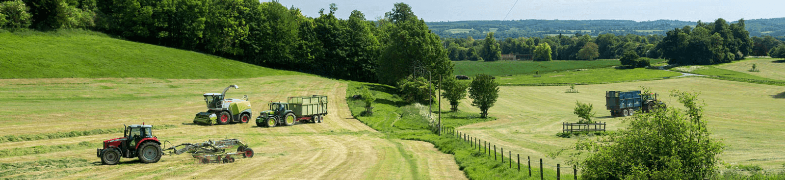 Farm vehicles in green fields in Chevening Estate