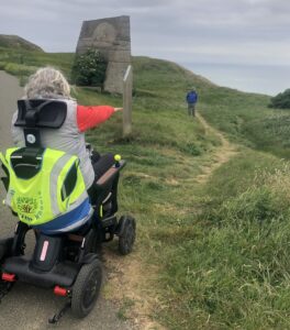 Gini Mitchell, founder of Wild With Wheels, navigating a path to the Abbot's Cliff Sound Mirror